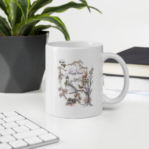 Image of glossy mug with imaginitive illustration including the words "find your happy place"